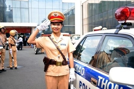 Traffic policemen learn how to smile with, apologize to people