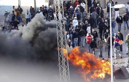 Tunisia announces curfew following unrest