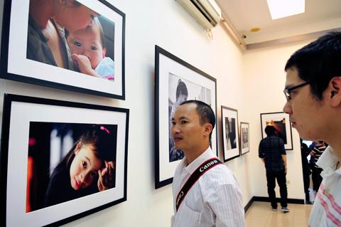 Photo exhibition by Minister and Buddhist monks