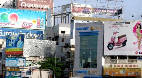 Disorderly outdoor advertising boards in HCM City