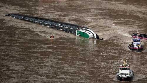 Ship carrying acid capsizes on Rhine in Germany