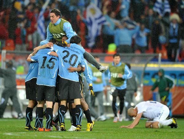 Ghana, Uruguay reach World Cup quarters