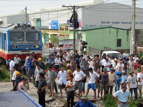 Passenger train collides with container truck