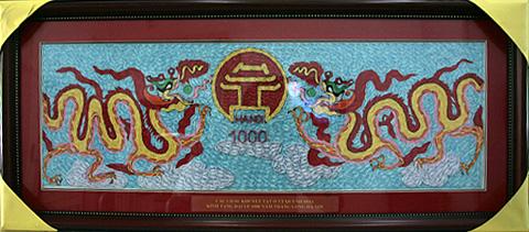 Giant paper-rolling picture for Hanoi&rsquo;s 1000th birthday