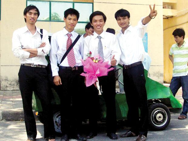 Three students and the green car